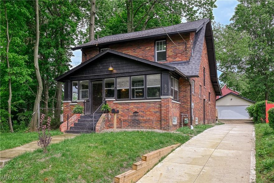 Stately 1929 Renovated Brick Beauty in West Akron
This renovated brick home nestled in West Akron, blending timeless 1929 charm with thoughtful, modern updates. With 3 spacious bedrooms and over 1,600 square feet of living space, this home offers the perfect combination of character, comfort, and style.
Step inside to an open floor plan filled with natural light and original charm. The large living room features a classic fireplace, creating a cozy focal point. The spacious dining room, accented by a striking chandelier and surrounded by bright windows, is ideal for gatherings and everyday meals.
The fully remodeled eat-in kitchen is a true highlight offering new white cabinetry, granite countertops, beautiful flooring, and a delightful breakfast room. The built-in pantry adds convenience, and abundant natural light enhances the warm, inviting atmosphere. Just off the back entrance, a stylish drop zone/mudroom provides the perfect space for coats, shoes, and bags.
Upstairs, you'll find three generously sized bedrooms and a beautifully updated bathroom with space to relax and refresh.
The clean and functional basement includes a freshly finished laundry area with new water lines and a utility sink making laundry day easy and efficient.
Extensive updates include: new roof, gutters, and downspouts. New high-efficiency furnace, water heater, and windows. Updated plumbing, wiring, and electrical service panel. New insulation and lighting. Fresh paint and beautiful new flooring throughout New concrete driveway, garage door. 
This exceptional home is full of character, completely move-in ready, Home Warranty and located in one of West Akron's most charming neighborhoods.