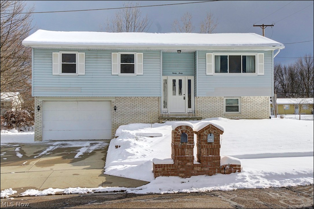 Beautiful well maintained Bi-Level with newly updated open floor plan. Updated kitchen with sliding door off the dining room leading out to the custom deck. Professionally landscaped yard with newly added patio and much more, this home is a must see and won't last long!!