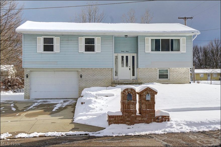 Beautiful well maintained Bi-Level with newly updated open floor plan. Updated kitchen with sliding door off the dining room leading out to the custom deck.  Professionally landscaped yard with newly added patio and much more, this home is a must see and won't last long!!