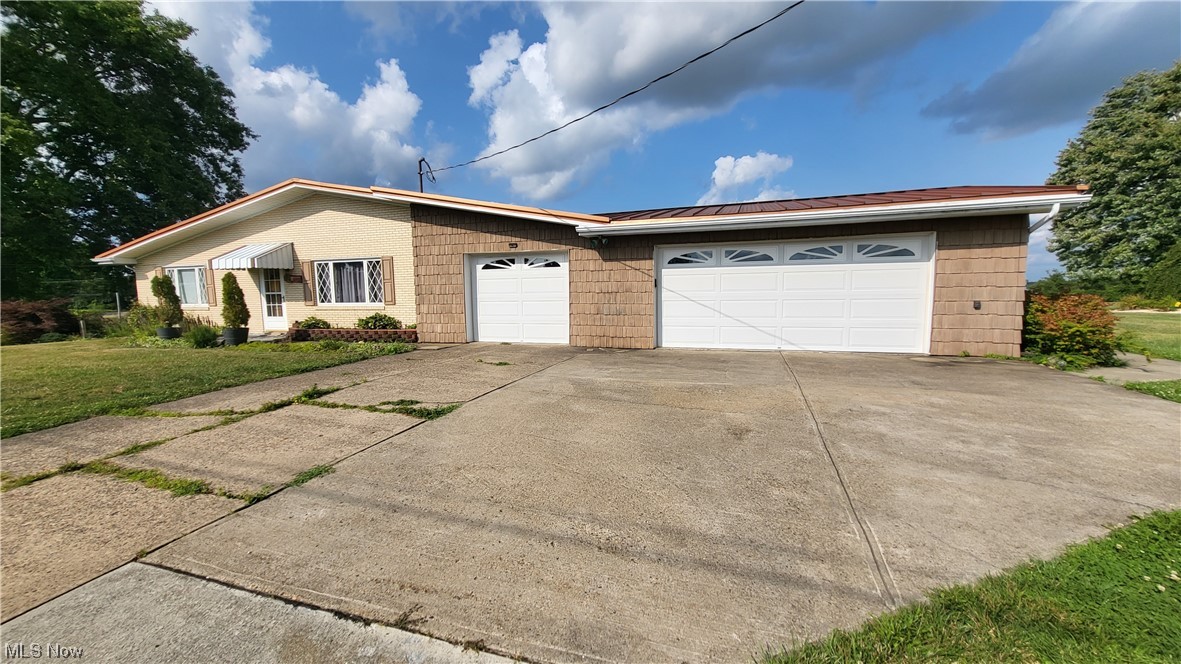 Well built, nicely maintained brick ranch on County Road 15, Rayland! On 1 acre of land, this 2 bed 2 bath, with a finished basement features a custom, eat-in kitchen that includes granite counters, an island, newer appliances and most importantly leads to a sunroom with breathtaking views. Large living room with propane fireplace. Outdoor patio PLUS additional covered patio area outside the basement door. There is also another space in the backyard complete with firepit that is perfect for entertaining. 3 car attached garage with plenty of storage, all you have to do is move in! Seller states there is hard wood flooring under carpet. Call your favorite agent today for a private tour!
Selling AS IS with buyers right to inspect. Showings start Monday August 14, 2023.