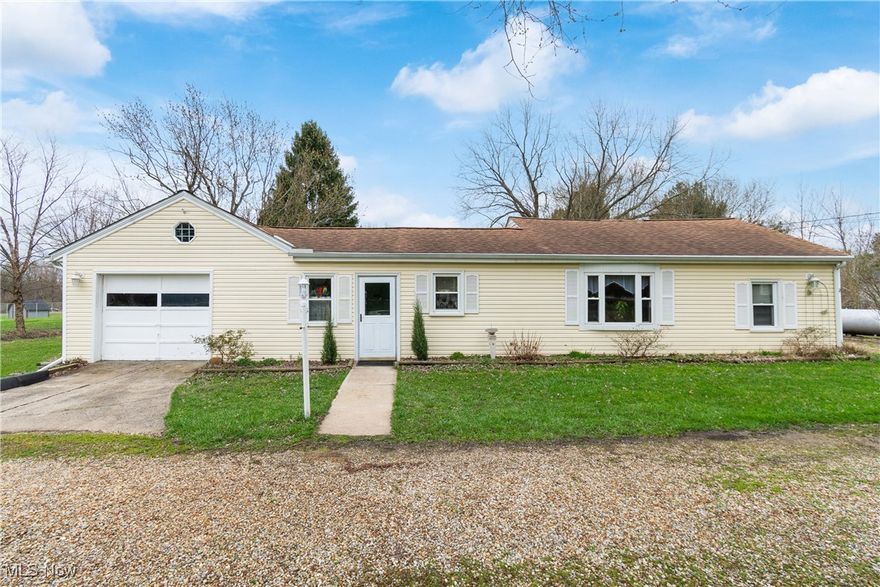 Welcome to this adorable ranch home sitting on a beautiful 2.98 acre lot in Cloverleaf LSD! Lovingly cared for, this home offers a bright and open floor plan, beautiful beamed ceilings, 3 bedrooms, 1 bathroom, first floor laundry room with custom built in cabinets, an updated kitchen, generous size dining room fitting for most table setups, waterproofed(Ohio State Waterproofing)/dry basement, a 1+ car garage with workbench area, and 2 barns/outbuildings on the property! Some updates include, HWT (2024), Water softener (2023), well pump and pressure tank (2019), New line to septic (2022-regularly cleaned and serviced), carpet (2022), roof (~2015), furnace (Dec. 2005-regularly serviced), windows (~2000), electric panel (~2000). Public water is available at the street. You will want to check this one out!