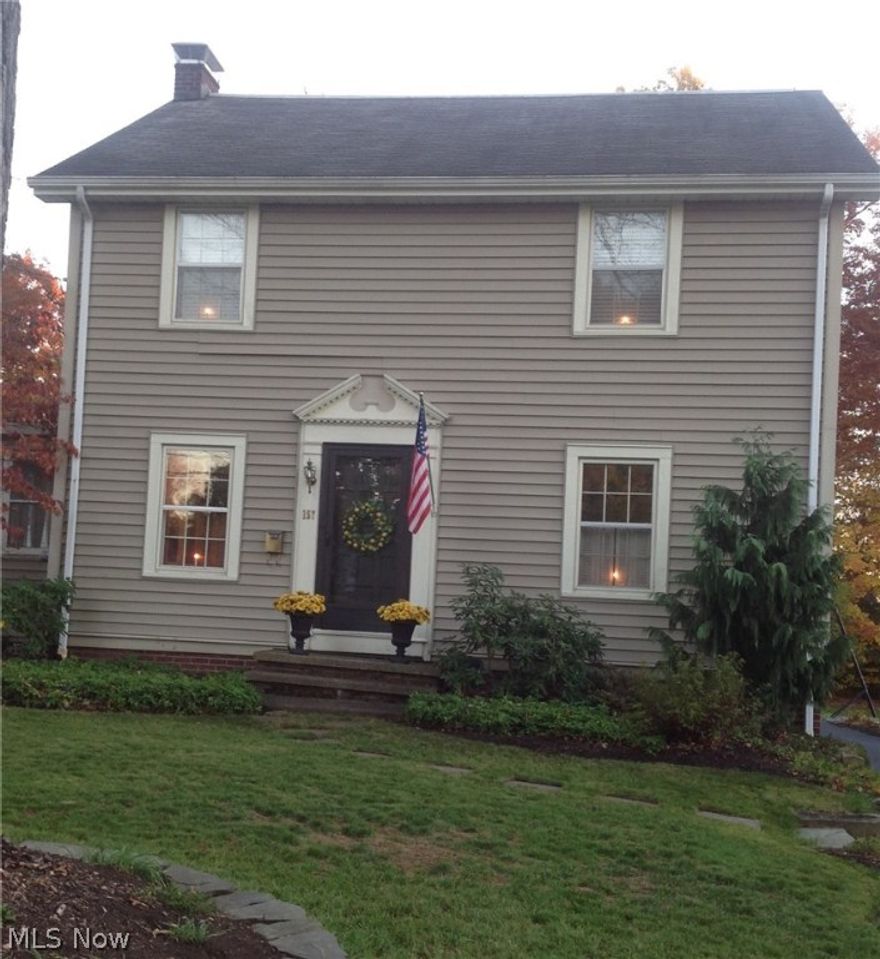 Old world charm and recent updates combine in this move in ready Boardman colonial. Stunning high end kitchen remodel with custom cabinets, marble counters, travertine tile backsplash and engineered hardwood flooring..all stainless appliances remain. Spacious living room with fireplace and built-in shelving opens to adorable enclosed porch with swing. The beautiful archway leads to the staircase or back into the kitchen.  Rear entry way features a powder room for guests and mudroom area with custom bench seating and built-in coatracks. Upstairs you will find 3 large bedrooms all with hardwood floors and ample closet space. The  updated bathroom has a seperate tub and marble tiled shower with marble tile detail in floor, gorgeous vanity with granite counter. The newer composite deck offers both outdoor entertaining space, low exterior maintenance. it steps down to a nicely landscaped yard with firepit area. The 2+ car garage has storage space and the full basement with newer furnace and