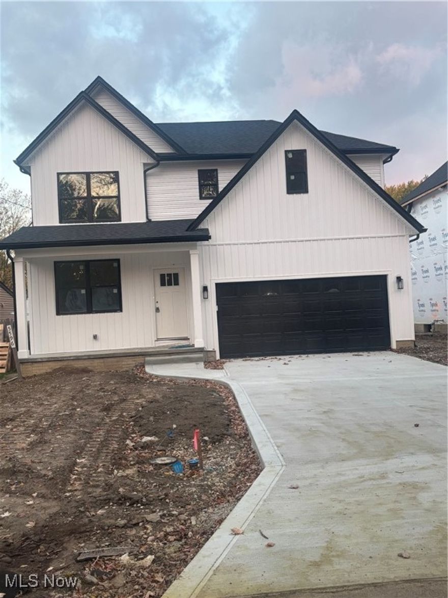 Welcome to your dream home at 5596 Grove St! This stunning new build, set to be completed by the end of November, offers modern living in a desirable neighborhood. With 2,146 sq ft of thoughtfully designed space, this home features a spacious open floor plan with 9 ft ceilings and luxurious LVP flooring throughout the first floor.

The heart of the home is the inviting kitchen, equipped with white shaker soft-close cabinets and elegant quartz countertops, seamlessly flowing into the living area. Enjoy cozy evenings by the electric fireplace while taking in views of your backyard. A convenient half bath completes the first floor, along with a versatile bedroom that can serve as a guest room or home office.

Upstairs, you'll find plush carpeting in the bedrooms, with LVP flooring in the wet areas. The second floor boasts a well-appointed laundry room and four additional bedrooms, including a spacious master suite featuring a full master bathroom. A second full bath serves the other bedrooms, ensuring comfort for family and guests alike.

The home also includes a full unfinished basement with poured concrete walls, perfect for future expansion or storage. The concrete driveway adds to the curb appeal, and with a 1-year builder's warranty, you can move in with peace of mind.

Don’t miss the opportunity to make this beautiful home yours!