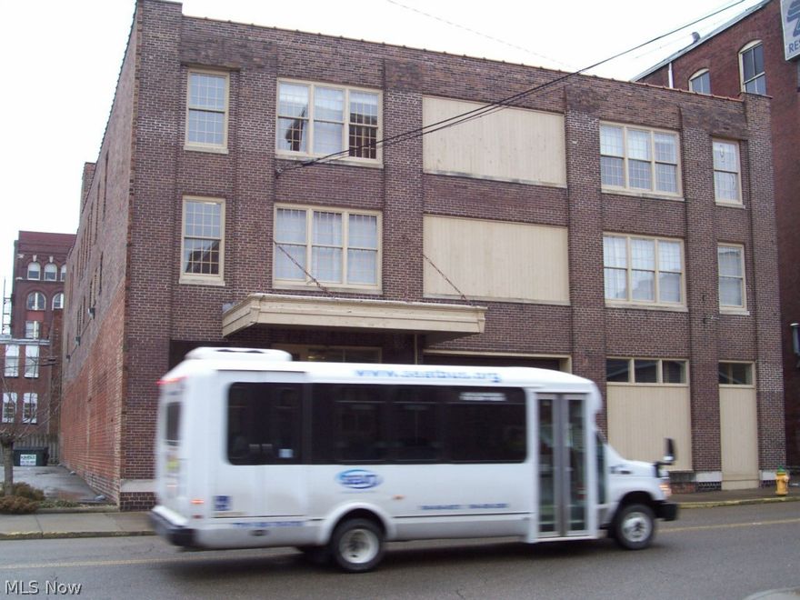 Once used as Warehouse, 3 stories with fright door and loading dock in downtown Zaneville, Ohio