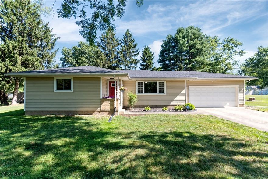 Welcome to this charming 3-bedroom, 1-bath ranch nestled on nearly half an acre in the heart of Norton. This home features a bright and airy layout with rich hardwood floors, oversized picture windows, and a spacious living room perfect for gatherings. The cheerful kitchen offers white cabinetry, a functional breakfast bar, stainless steel refrigerator, and a fresh, modern feel that opens to a sunny dining area. Each bedroom is spacious and light-filled with scenic views and ample closet space. The bathroom has been tastefully updated with a neutral palette and clean finishes. Downstairs, you’ll find a full basement offering additional living space, storage, or the perfect area for a home gym, playroom, or office. Step outside to your private backyard oasis, complete with a large storage shed, firepit and sitting area, and a play-ready lawn — ideal for both quiet evenings and active weekends. A two-car attached garage and extra-deep driveway offer plenty of parking and convenience. With a functional single-floor layout, bonus basement space, and a quiet neighborhood setting, this move-in-ready ranch is truly a hidden gem in Norton.  For your convenience there will be an OPEN HOUSE on Saturday, July 26th from 11-12.