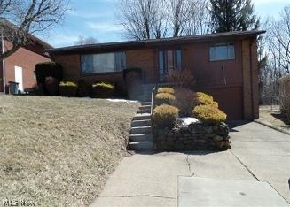 One story, 4 BR home, 2 full baths. Two car tandem garage in basement.