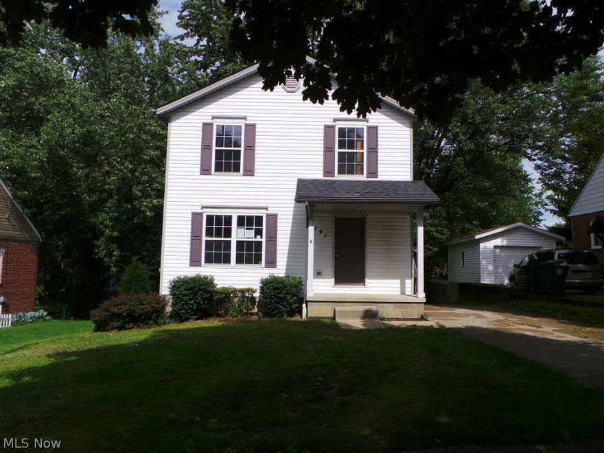 Three bedroom colonial with spacious living room and large eat in kitchen.  Private treed lot with deck off kitchen.  Walk out basement!  Property is sold AS IS.