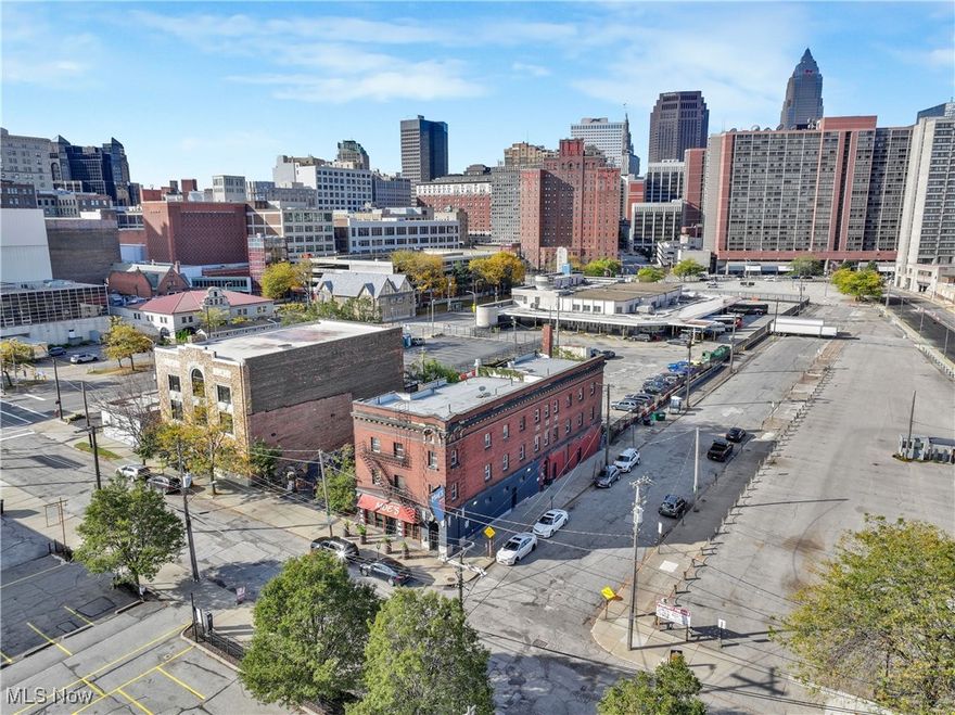 Where History Meets Opportunity.
Step into the heart of Cleveland’s next wave of urban transformation. Once known as the “Cadillac Furnished Rooms” - a haven for immigrants and workers chasing the American dream in the early 1900s - this iconic three-story brick landmark stands proudly at 1740 E 17th St, just steps from Cleveland State University and Playhouse Square.
With Playhouse Square actively acquiring the surrounding properties, this site sits at the epicenter of a rapidly evolving downtown corridor. The area is poised for growth, with demand rising for hospitality, housing, and entertainment that celebrates Cleveland’s rich industrial past and creative future.

The Vision-
Picture it: The Cadillac Speakeasy - a glowing revival of Cleveland’s early-century glamour - paired with elevated loft suites above, each blending exposed brick, modern design, and panoramic city views. A developer could preserve the building’s historic soul while creating one of downtown Cleveland’s most distinctive boutique living or hospitality destinations.

This isn’t just a redevelopment - it’s a chance to write the next chapter in Cleveland’s story.