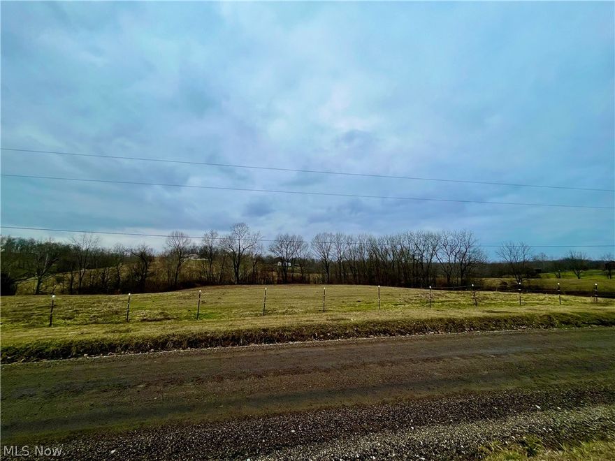 Newly split parcel offering nearly 3 beautiful acres of rolling clearings and the surprise of creekside peacefulness at the rear of the property.  A must see!  
Listing agent related to sellers.  Subsurface rights do not convey.  Adjacent parcels listed separately.