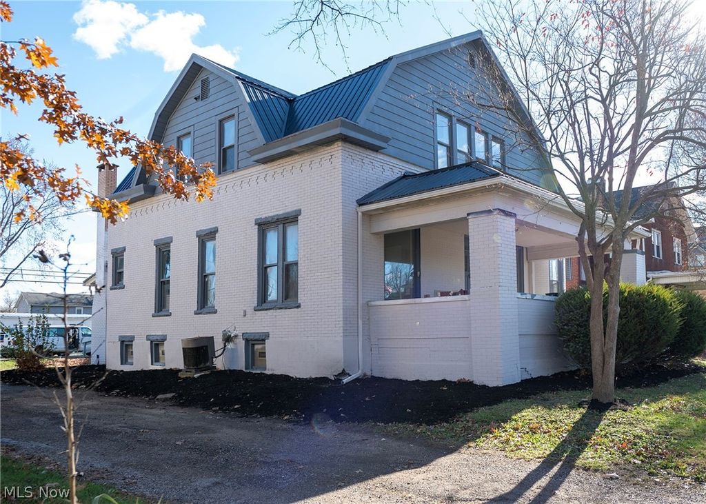 Photo of 911 N Water Street, Uhrichsville, OH 44683 (MLS # 5206367)
