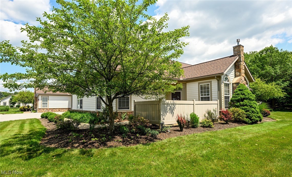 A new opportunity to join the coveted Crossings At Northwest condo community is here! If you are not familiar with this community, you'll want to be. Located off Northwest Ave, in between the Tallmadge Circle & Howe Rd. Close to all your favorite shops, dining & breweries that Tallmadge, Cuyahoga Falls & Akron have to offer. Just minutes to great outdoor activities at the Brookledge Golf Club & Munroe Falls Metro Park too! Possibly the most meticulously maintained neighborhood with amazing amenities, like the gorgeous pond, pool, community center, library & fitness center! This rare unit offers 3 bedrooms total with TWO master suites (one on the first and one on the second floor)! The amazing open floorplan begins with a tiled entry & opens up to a very specious living room with windows stretching up to the vaulted ceiling & a fireplace. The wide open area between the living room & kitchen is a flexible space to accommodate any style dining set. Sleek dark granite starts at the raised breakfast bar & runs through the large kitchen, providing an amazing amount of counterspace. Tons of cabinets, newer stainless steel appliances, pantry, LVT flooring & a cool copper light fixture complete the kitchen. You will also find a great first floor laundry room & garage access off of the kitchen as well. Down the hall is a convenient half bathroom, a large spare bedroom & a master bedroom with private bathroom. Both bedrooms have fantastic walk-in closets & great natural light! Don't miss the second floor! This huge loft style space is a second owners suite with an over-sized full bathroom, linen and walk-in closets! There's bonus storage in the attic space above the garage too! The icing on the cake is the lovely front patio with a privacy fence, retractable awning & a serene view of the trees. All new roof, siding, furnace, A/C, water heater, range, microwave, dishwasher & LVT flooring approximately 2023! Don't let yourself miss out on this one, CALL TODAY!