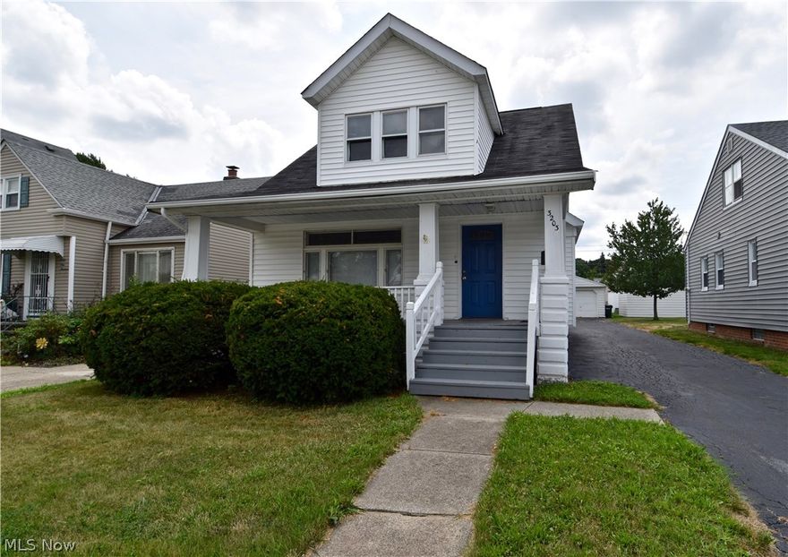 Charming home with natural woodwork, crown molding, leaded-glass windows, leaded-glass built-ins, new carpeting and flooring. Updated kitchen includes side-by-side refrigerator and five-burner gas range. First-floor bedroom and full bath. Second-floor has two bedrooms (one with vaulted ceiling) and full bath. Some replacement windows. Two-car garage. Front porch and large back deck. Low-maintenance vinyl siding. Originally a single-family house, converted to a two-family, and now conversion back to a single-family is officially complete per County record.