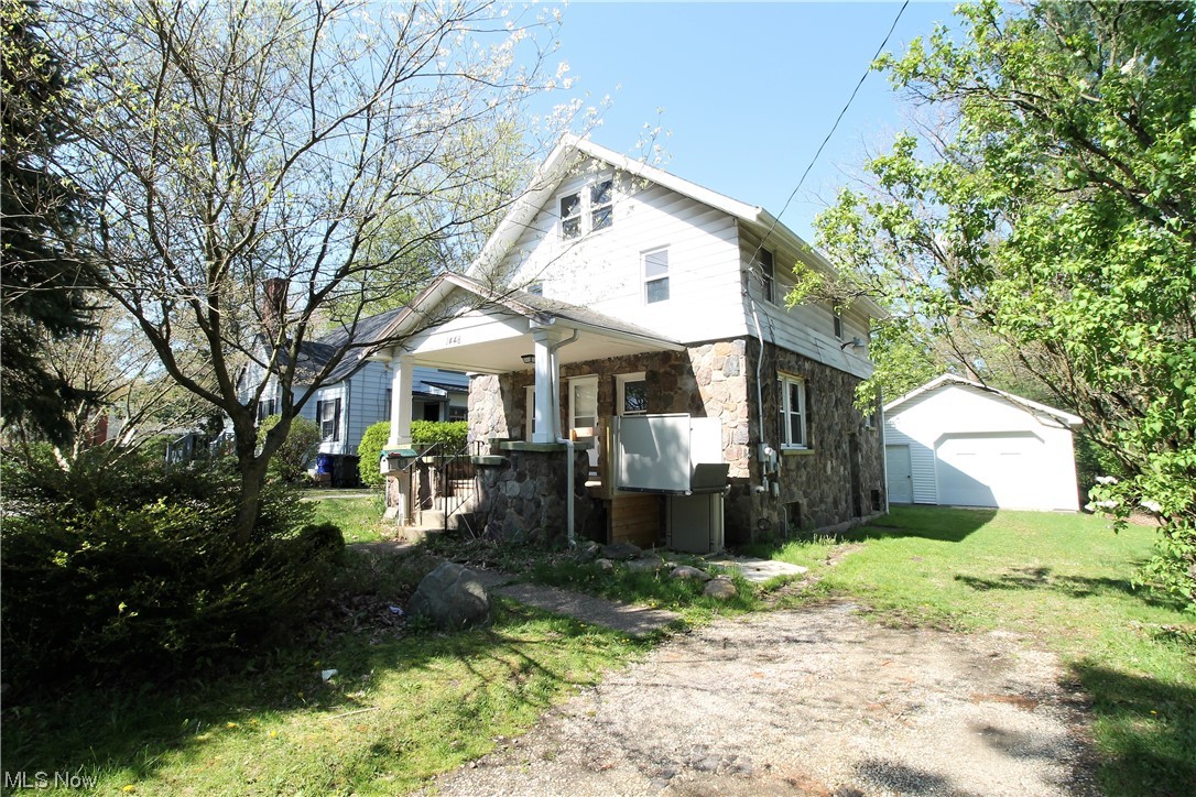Close to shopping, Kent State University campus, and restaurants! Charming three bedroom, one and half bath colonial home. New carpet and new paint, throughout the home. Large living room with original woodwork, fireplace and is open to the dining room and kitchen with new flooring. There is a half bath on the first floor. Upstairs you will find three bedrooms and a full bathroom with new flooring. The hallway offers built in shelves. The basement is unfinished and offers lots of space for storage, laundry area. The beautiful, large backyard would be great for entertaining or sitting out and just relaxing! Move in ready!