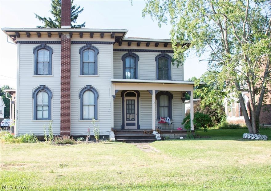 Step into a piece of history with this enchanting 4 bedroom, 1 and a half bath Victorian- style home, situated in East Rochester, within Minerva School District. Freshly painted throughout, this residence features a spacious kitchen with ample cabinets, a sizable yard, and a large barn with garage door, ideal for storage or a workshop. Enjoy the convenience of first-floor laundry and timeless charm of high ceilings and classic architectural details. This home offers a unique blend of historical elegance and modern comforts, making it a must-see. Schedule your viewing today and envision your future in this beautiful Victorian gem.