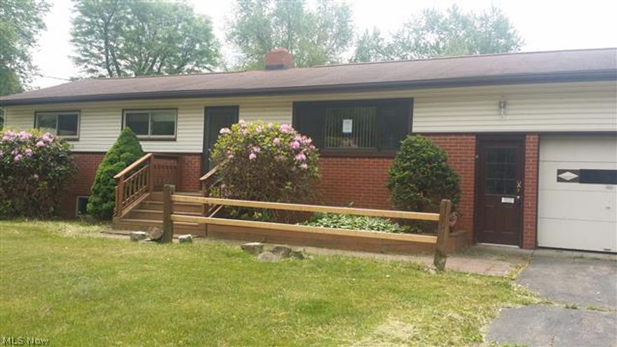 Sit out on the deck and enjoy! Large living room, kitchen with eating area,sunroom. Basement is finished but needs typical repairs, also has woodburning fireplace . This home is priced to sell!  Buyer & buyer's agent must use due diligence in area, schools, past history. Seller & listing agent
have no previous owner information. Sold AS IS