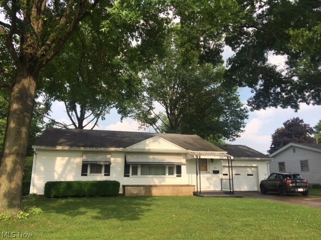 Not just a great location, but also a great home. One owner home that's been lovingly cared for. 3 bedrooms, 2 baths, attached oversized 2 car garage. Hardwood floors under the carpet in the living room & bedrooms. Finished family room in lower level with full bath and work shop area. Updated electric, and new replacement windows just this year. Immediate possession.