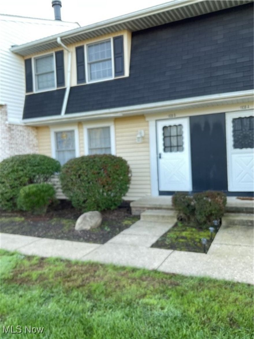 Welcome to this well-kept 3 bedroom, 1.5 bath townhouse offering comfort, space and convenience. The main level features a bright and open great room with a woodburning fireplace, a spacious kitchen with an eating area, and  a convenient half bath. Upstairs, you'll find three bedrooms and a full bath. The finished lower level includes a workshop area and laundry room, providing excellent extra space for hobbies or storage. Enjoy relaxing or entertaining on the private patio, and appreciate the ease of an attached garage. Move-in ready and full of potential!