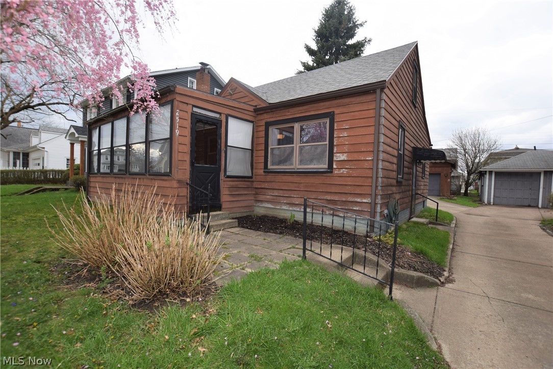 Welcome to 2519 10th Street NW – a lovely three bedroom, two bathroom home located in Canton. The fully enclosed front porch offers a perfect sitting area out of the elements. Step inside the front door into the spacious living room and immediately notice the gorgeous hardwood floors and arched doorways. The eat-in kitchen is naturally well-lit from the numerous windows. Two spacious bedrooms and one bathroom located on main floor. Both bedrooms have hardwood floors. Head upstairs to find a third large bedroom. The basement has a large rec area with a brick fireplace, the laundry hook-up, and the home’s second bathroom. This home has a new roof (2017) and a detached two-car garage with a new door opener installed in 2019 complete with keypad. Don’t miss your chance to own this lovely home!