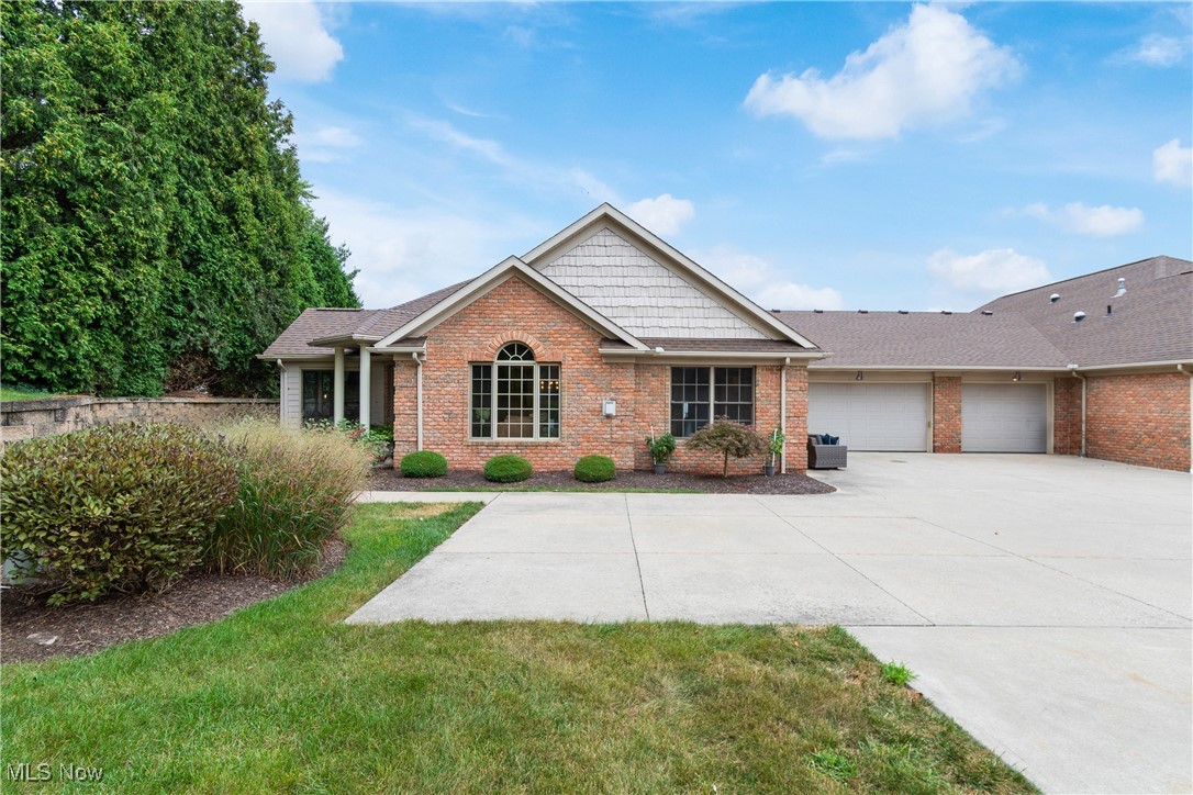 Welcome to 1240 Saint Abigail St. SW in the desirable Windham Bridge community of Hartville! This beautifully renovated ranch-style condominium offers 3 bedrooms, 2 full baths, and a versatile office/sunroom—all in the heart of Lake Township. Nestled on a quiet, quaint cul-de-sac, this home features a private corner entrance that opens into a spacious living room with vaulted ceilings, abundant natural light, and a cozy gas fireplace. Barn doors lead to the bright sunroom, highlighted by four tall Pella windows. The open-concept layout flows seamlessly into the dining area and fully updated kitchen, complete with quartz countertops, stainless steel appliances, a breakfast bar, and a pantry. A first-floor laundry room with added cabinetry and a utility sink connects conveniently to the attached 2-car garage. The vaulted master suite boasts a walk-in closet, soaking tub, and separate shower. Two additional bedrooms and a fully remodeled bathroom provide plenty of space for guests. The expansive lower level is ready for your vision, with plumbing already in place for a full bath and ample room for additional bedrooms or living areas. Windham Bridge offers well-maintained landscaping, a community pond, and HOA services that cover cable, internet, trash, snow removal, exterior maintenance, and lawn care. This move-in ready home is a rare opportunity to own one of Hartville’s most sought-after condominiums. Schedule your private showing today!