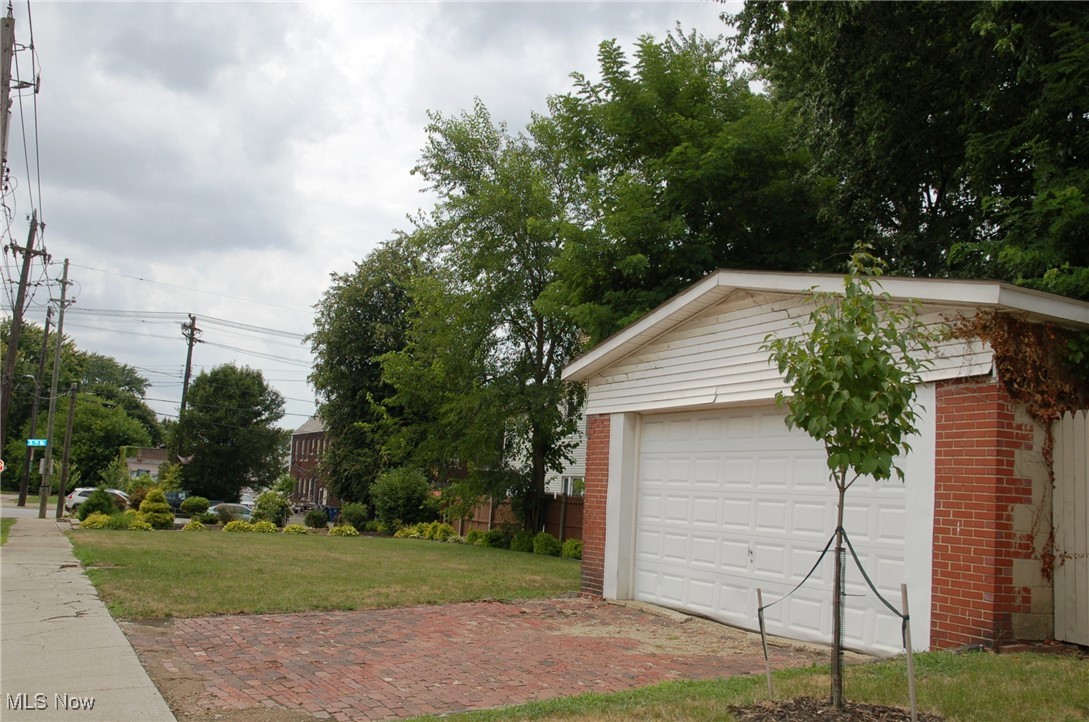 New to Market! Hurry to view this Commercial Lot located just steps away from the border of Cuyahoga Heights-close to I-77--convenient to I-480 and Downtown. This corner lot includes a 2-Car Garage with a replaced Garage Door and Roof. There is a brick paver driveway. The lot has a 43ft. frontage x 158 depth. The curb appeal of this lot tremendous-shows an expansive space to accommodate your need. This lot has extensive landscaping bordered by a fence on the North side. Water, Sewer, Electricity and Gas are available.