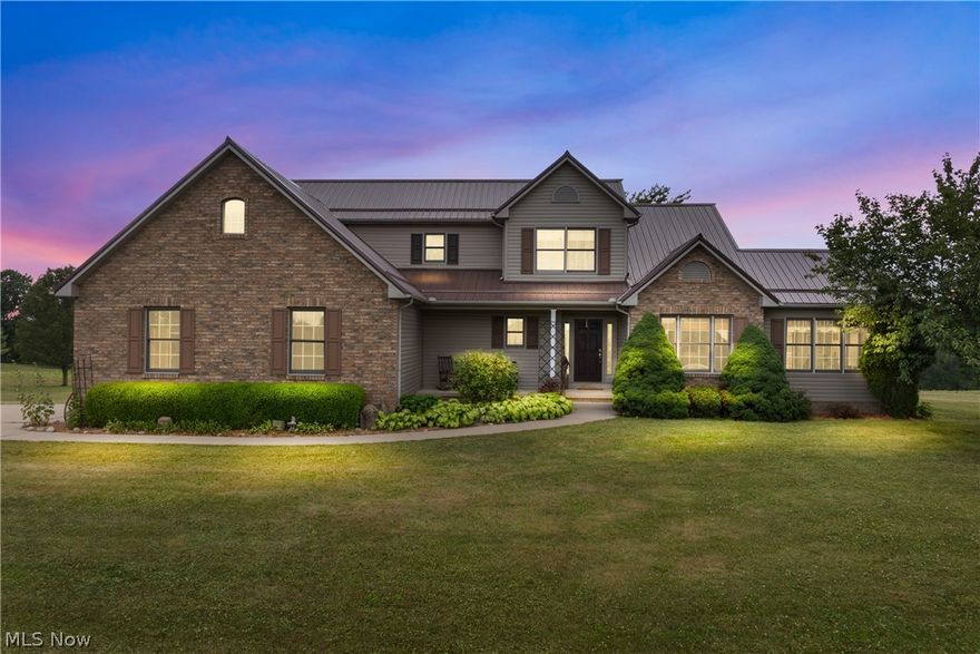 Quality Built 3 Bedroom Home on 7.71 Acres - Beautiful Setting Well Off Road Overlooking Countryside - Detached 24'x24' Garage – Carrollton Schools - Harrison Twp – NW Carroll County. Enjoy country living at its finest! Fall in love with this beautiful three-bedroom home and its private country setting overlooking farm fields. Come home from work and relax watching the deer and wildlife across the countryside. This home, built in 2001, features a spacious first-floor master bedroom with a full bath, walk-in closet, large living room with vaulted ceilings and vent-less LP fireplace, dining room, oak kitchen, and dinette area. Four-seasons sun room with panoramic views and sliding door to back deck.  First-floor utility room with washer and dryer. Upstairs you will find two bedrooms, a full bath, a railing overlooking the living room, and a large walk-in storage room. There is no lack of storage closets throughout the home. Spacious walk-out basement with enclosed office or possible 4th bedroom, Geo-Thermal heating and cooling, 200 amp breaker electric, and backup generator system. Two-car garage. New Roof and Siding in Fall 2023. Detached 24'x24' garage for recreation vehicles or workshop. This property is conveniently located minutes from Carrollton and only 35 min from Canton, OH. ½ Taxes $1,777.00 Practically move-in ready and clean home. Call today to schedule a showing or for more information.