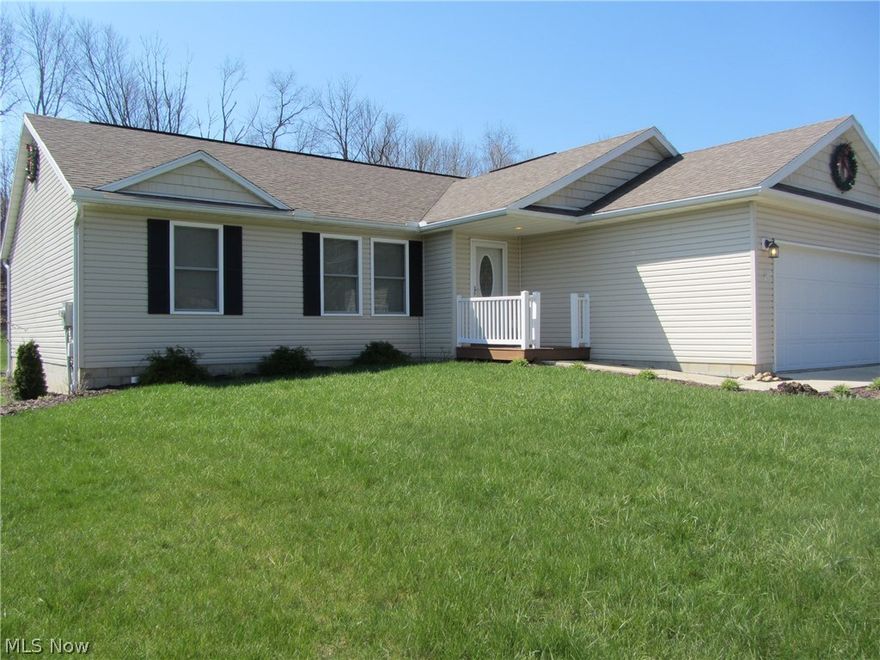 Open floor plan includes living, dining and kitchen with vaulted ceiling.  Master bedroom, bath and walk in closet on one side of house and 2 bedrooms and bath on the other. There is a first floor laundry and a convenient entry to the house from the garage. Beautiful hardwood floors compliment the main living area and patio doors take you out to a canopy covered deck and large back yard.  The basement is huge with lots and lots of space for more living area and storage.  Very short and convenient distance to Danville-Amity road.