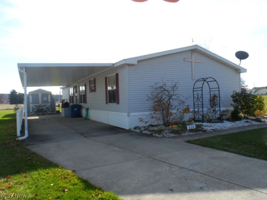 Spacious double wide manufactured home in Brookside Village.  This well maintained home features an open floor plan with a master suite including two closets and a master bath that features a garden tub and double sinks.  Open kitchen with skylight features gas stove, refrigerator and built-in dishwasher.  Dining room has Berber carpet and plenty of room for holiday entertaining.  There are an additional two bedrooms and full guest bath, plus a laundry room. All Berber carpet is approx. 3 years old and entire interior was painted approx. 3 years ago.  There is a 10x16 outdoor shed, plus covered carport.