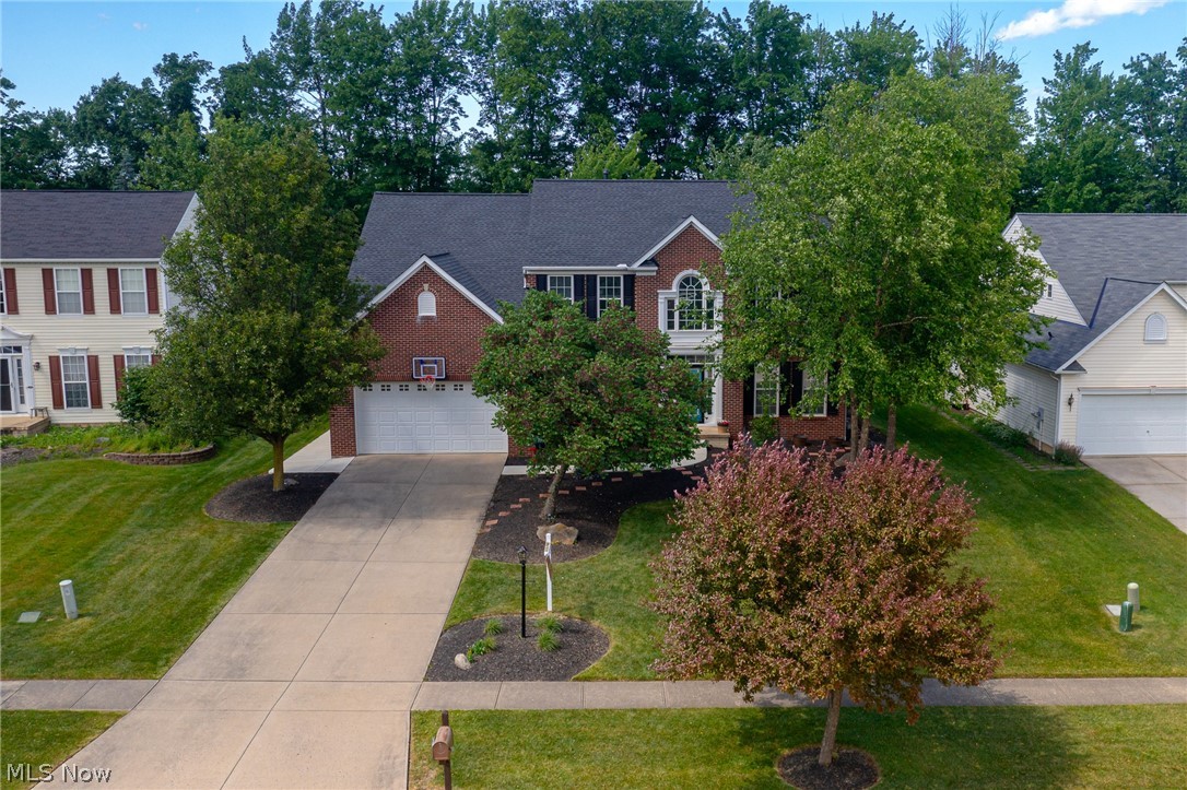 Stunning spacious four-bedroom 3 1/2 bath colonial with brick front, first floor, laundry room, impressive two story foyer entry. Fabulous eat in kitchen with granite counter tops, stainless steel appliances, and island all open to the great room that offers beautiful Brazilian wood floor. Featuring many newer updates, including, roof, furnace, and central air. Plus finished rec room located on quiet cul-de-sac street. Private fenced 75’x170’ backyard with large patio. This lovely home is in meticulous move-in condition ready for immediate occupancy.