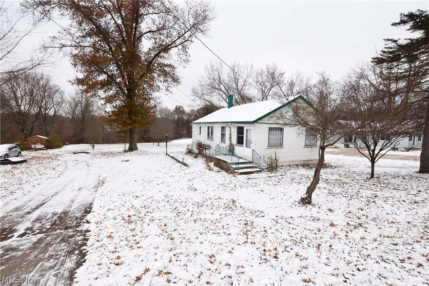 Two-bedroom, one bathroom investment opportunity located in Coventry near Portage Lakes. This home boasts a large yard gently sloping to the back of the lot. The kitchen remodel was started with Cherry cabinets, needs completed. Dining room offers more free space in the kitchen. The living room is large and has a bonus room sitting room attached. Second bedroom will need a closet added. Don't miss out on this charming property with potential! This property is to be sold AS IS. Call today to schedule your private tour.
