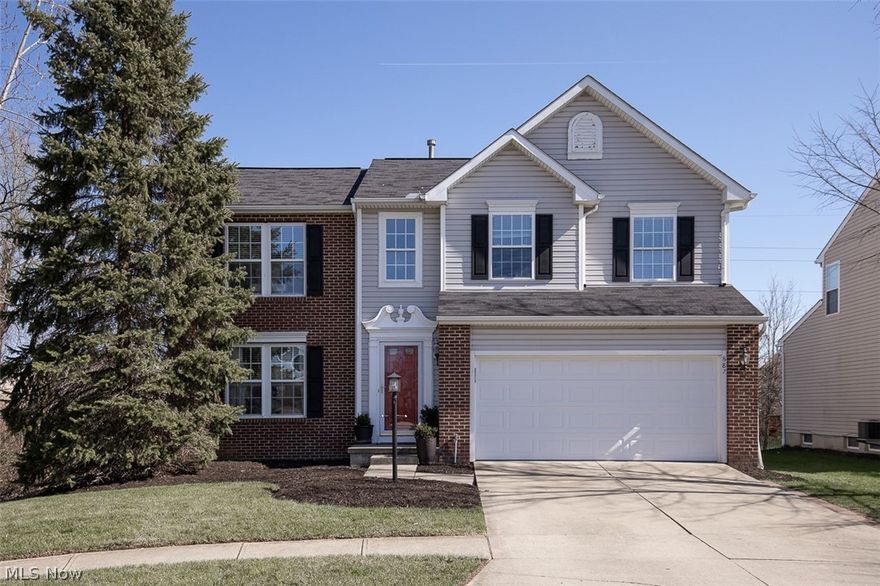 Welcome to 887 Woodfield Ln in Brunswick’s desirable Autumnwood neighborhood! Tucked at the end of a private cul-de-sac, this 4-bed single-family home in Brunswick offers a rare wooded ravine backdrop that creates a peaceful, private setting! With 1,994 square feet above grade and an additional 750 square feet in the finished basement, the layout balances open living with functional space. Step inside to a bright, expansive great room filled with natural light and anchored by a gas fireplace. The open flow leads into the updated kitchen featuring marble countertops, white subway tile backsplash, stainless steel appliances, and a spacious morning room that is ideal for everyday meals or gatherings!  A convenient first-floor laundry adds everyday ease. Upstairs, the large primary suite includes a walk-in closet and en-suite bath, while three additional bedrooms and a full bath provide flexibility for guests, work-from-home setups, or hobbies. The finished basement is designed for entertainment, complete with a theater area, projector, and impressive 115-inch screen, plus additional storage space. Sliding glass doors lead to a stamped patio that feels especially private when the surrounding trees are in full bloom!  Recent updates include a new hot water tank (2026), updated appliances (2023), and refreshed landscaping. Located just minutes from Route 303, major highways, shopping, coffee shops, restaurants, and within the Brunswick City School District, this home offers both convenience and a tucked-away neighborhood feel!