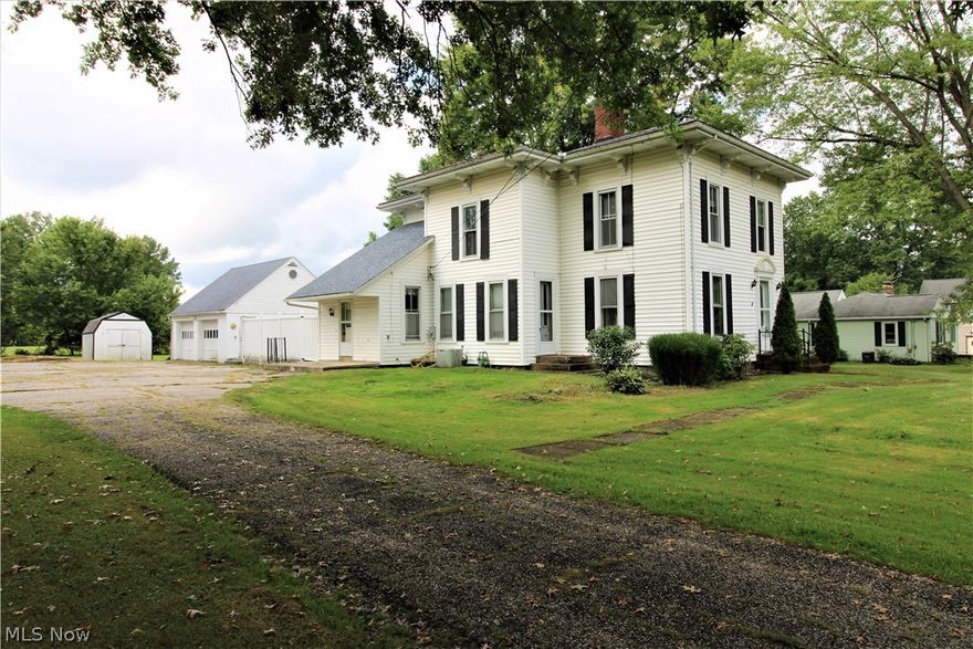 Looking for a Big Century Home with all the Flair? This one has it! Spacious with 9 ft ceilings, 4/5 Bedrooms, Total of 2 full baths (one on each floor) Built in 1880, but Effective year is 1960! Upon side entry to home and stepping into the large kitchen, (stove and fridge optional) Fabulous Dining Room for all the entertaining, (unique barn door added) and into the study room/or could use for first floor bedroom! Formal Living Room. 1st floor Bathroom, and 1st floor Laundry/Utility Room. Newer carpet throughout. Striking Foyer with steps to the 2nd floor with 4 Bedrooms and Updated Full Bathroom! Outside to the Beveled Woodwork around the eaves of home, Roomy Deck off back of home, 2 car garage with steps off back to extra Storage Space above, storage shed. A few trees were taken down in yard. Nice village lot of almost 3/4 of an acre! Close to all the amenities of town living!