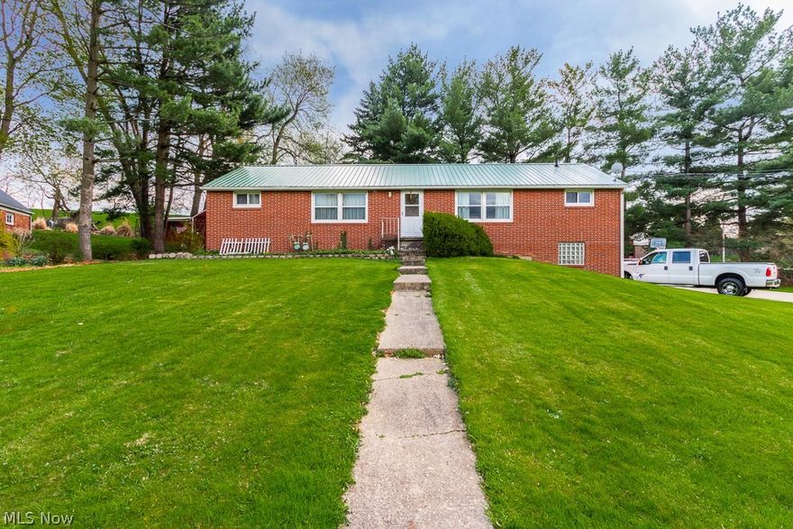 Duplex in Plain Twp, brick ranch with full basement, metal roof, and 2 car attached garage. Low maintenance and well cared for, this is a solid investment! Tenant pays gas and electric, while the landlord pays Canton City Utilities ($830/yr)