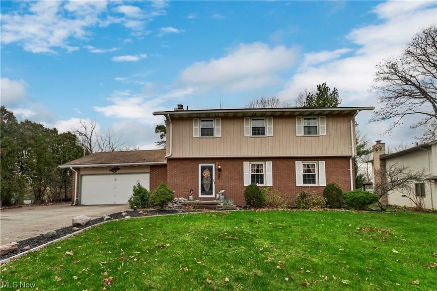 MOTIVATED SELLERS! This is a must see 4 bedroom, 2.5 bathroom, brick & cedar home nestled on a quiet cul-de-sac, offering space to accommodate a large growing family. Before entering the heated 2 car attached garage with an additional storage room, take note of the double wide concrete driveway with a side slab for an RV or boat parking. Step into this home's foyer that offers a half bath, coat closet, and an updated mudroom. Pergo laminate wood flooring throughout Main level. Freshly painted large living room and formal dining room. Beyond the foyer you will find a family room with a gas fireplace, hardwood parquet flooring, 2 built-in shelves, and a set of French doors that opens up to the large carpeted 3 season room/enclosed patio surrounded by walls of patio doors to view the large deck and wooded backyard that host 2 large sheds. On the 2nd level you will be pleasantly pleased with the oversized master bedroom with two walk-in closets and a master bathroom. The 2nd floor is completed with 3 additional large bedrooms with ample closet space and another full bathroom. Entertain family and friends in the large finished basement that offers 2 additional rooms, one with laundry hook up. Newer electrical panel (2018). roof (2004), appliance stays (stove, refrigerator, dishwasher, garage disposal). Excellent location for dining, shopping, and close to the turnpike and major highways. Do not miss your opportunity to own this amazing property and be "home" for the holidays!!!