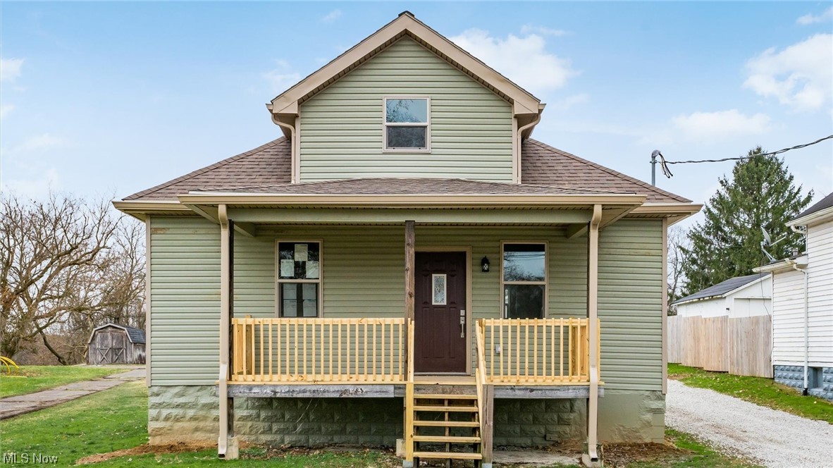 This home has been recently updated. Let the pictures tell the story. New kitchen with white cabinets, an island with a wood counter with space for seating, stainless appliances that include a refrigerator, range, micro-wave, and dishwasher. The kitchen is open to the living room. There is a primary bedroom and full bath on the first floor. This full bath offers a tub/shower combination. There is a second bedroom and a half bath on the first floor. The second floor offers a very spacious second primary suite. The full bath has a tiled, walk in shower. On this level you have storage on each side. There is new flooring, lighting, doors (interior and exterior) roof, windows, central air conditioning, gas furnace, covered front porch and back deck. There is a detached 2 car garage with a space for a workshop.
