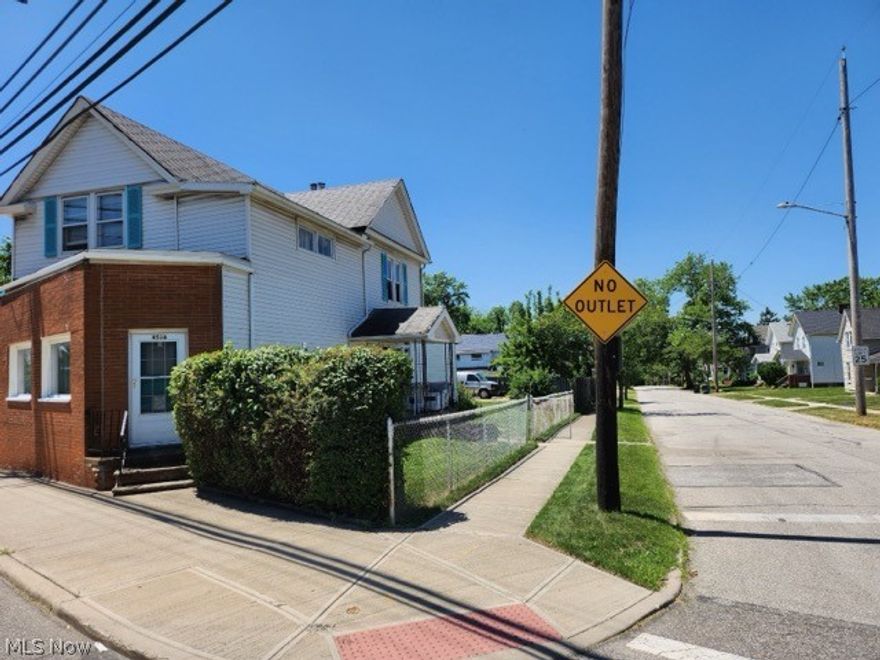 First time home buyers & investors welcome. This very spacious home with a lot to offer is located on bus line and within close proximity to the downtown area, schools, and grocery stores. 4 bedrooms, 1 1/2 baths, a first floor room that can potentially make 4th bedroom, eat in kitchen, partially finished walk out basement that includes an additional kitchen and glass block windows. All appliances stay. Central air, newer furnace and electrical. If you enjoy gardening a pear tree, fig tree, and rose bushes are in the fenced in yard. The property is zoned for a business as well. Bring your decorating ideas and your offers.