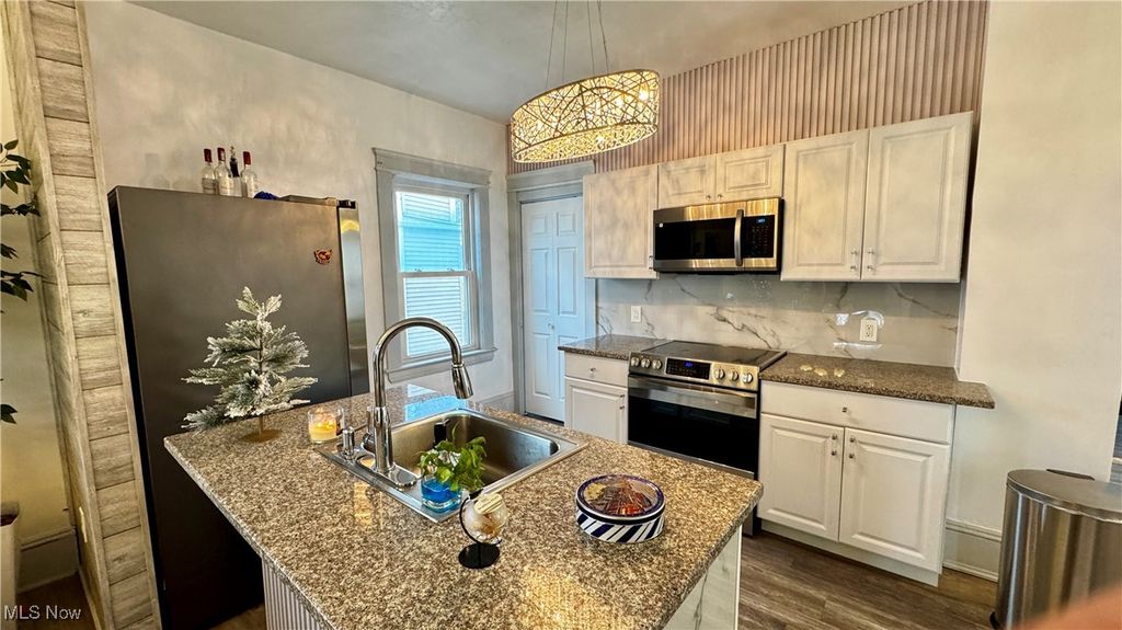 Photo of 4001 E 54th Street, Cleveland, OH 44105 (MLS # 5178711)