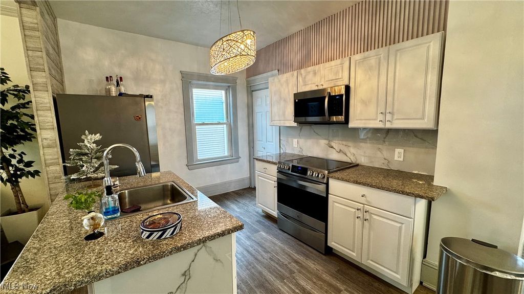 Photo of 4001 E 54th Street, Cleveland, OH 44105 (MLS # 5178711)