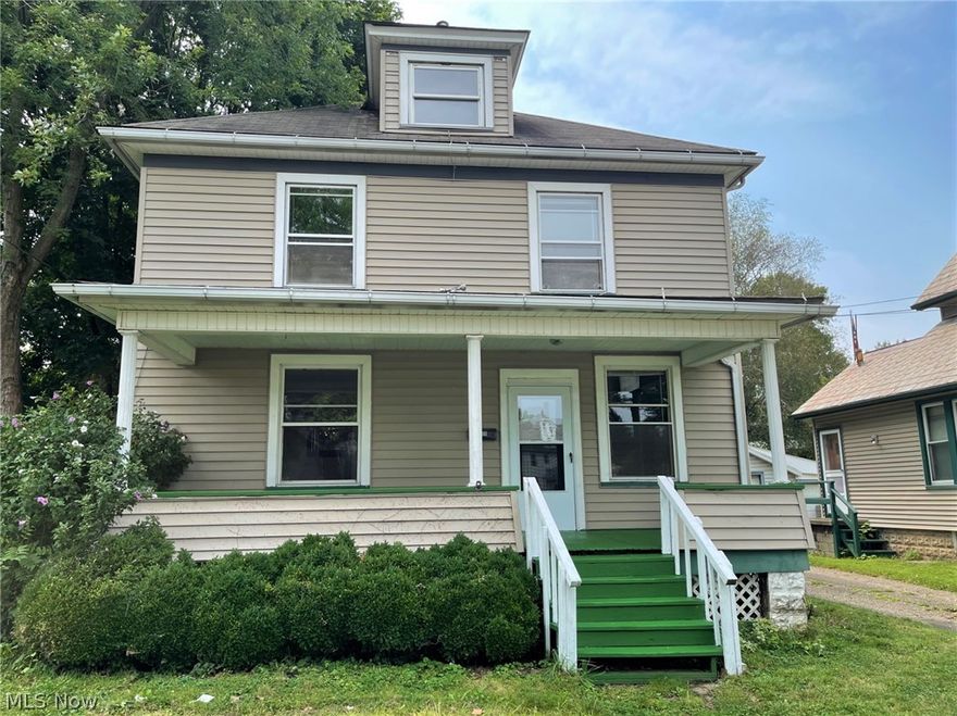 Four bedroom home with 1,680 sf of living space. Spacious foyer, eat in kitchen, living room with corner fireplace and dining room. Original woodwork. Storage space in attic. Two car, detached garage. Covered front porch.