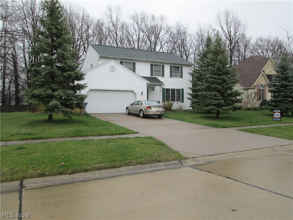 Custom built 4-bedroom colonial, located in a Lakefront community, Edison Estates. No rear neighbors. Purchased in 1998 as a builder spec home. Well-built home boasts 1934 sqft and a .37 acre lot. This unique Lake Front development includes a private 2.63 acre park on Lake Erie with gorgeous sunset views. Enjoy the great Lake Erie sunrises and sunsets from the park. This great home has a wonderful layout, spacious bedrooms, and 2.5 baths. The foyer entry has ceramic tile floor. First floor includes a Large Living room (18x14), and a spacious Family room (21x14) with gas fireplace. The eat-in Kitchen features oak cabinets, refrigerator, dishwasher, microwave, and a first floor laundry room off the kitchen. Newer Pella sliding glass door leads to a great concrete patio off the kitchen for barbecues and entertaining outside. Master bedroom has walk-in closet, master bath with garden tub, and walk-in shower. Double hung tilt-in windows for easy cleaning. Full unfinished base