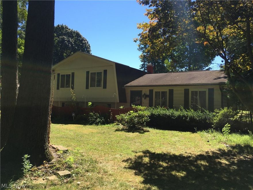 This 3 bedroom, 2.5 bath split comes with hardwood floors, beautiful tiled rec room, and an open concept kitchen with breakfast bar. Lot is .40 acres. Two car attached garage, patio, shed, and a security system. Freshly paved street.