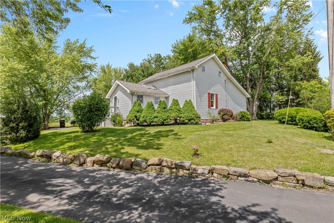 A country lifestyle awaits you in this beautifully detailed 2 story home that sits on a lg. scenic landscaped lot bordered by a wooded area & an open field. This home has been priced to sell as is. You can even park 6 cars in the large paved driveway. Shopping is only 10 minutes away. Natural sunlight from 4 skylights. The large 16' x 11' screened in porch with ceiling light and fan is perfect for a cup of coffee in the morning or for socializing with friends & family. 1st floor bedroom w/walk in shower w/seat bathroom. Two family rooms on main floor. Close pocket doors to make private living space for 1st floor bedroom or convert to 3rd bedroom. Bedroom and full bath upstairs with tub/shower. Stackable washer and dryer off kitchen. New breaker box and lighting installed in basement in 2022. New furnace installed 3/5/19. New hot water tank 2020. This home sale contingent on seller finding a home to purchase. Preapproved buyers only.
