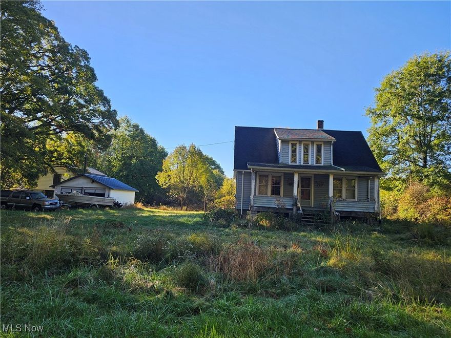 10 Beautiful acres waiting for you. This property is perfect for horses, hunting or just to enjoy. The home includes a two car detached garage with a pit as well as a large 2 story loft barn 768 sq ft built in 1984 with 3 stalls, electric, concrete floors, sliding doors, swing doors on back.. Home roof less than 12 years, furnace 4/5 years, garage roof 9 years,  updated electric, hwt 6 yrs. Central Air ready. Hunter tree stands stay. Home needs some tlc. Beautiful property.