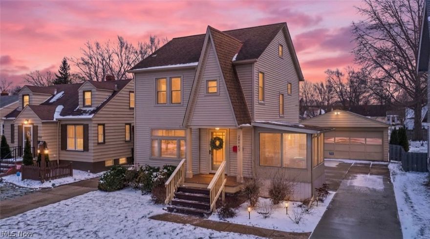 Charming and ideally located in the heart of Fairview Park, this home is just minutes from shopping and conveniences of Westgate and within walking distance to Bohlken and Linden Parks. It blends timeless character with thoughtful updates throughout.

Original, unpainted trim and doors create a warm, inviting feel, while a large living room window fills the space with natural light. A decorative fireplace creates a cozy focal point, perfect for everyday living or gathering with guests. A bright three-season room with newer tile flooring offers a sunny spot to enjoy the changing seasons.

The dining room features a classic built-in corner cabinet, both beautiful and functional, while still allowing space for entertaining. In the kitchen, tasteful updates including a newer range, hood, refrigerator and dishwasher complement the existing solid wood cabinetry, preserving the home's character while enhancing everyday functionality. A convenient landing area off the side entry adds practical main-level storage.

Upstairs, the spacious primary bedroom offers a true retreat, complete with access to the unfinished third floor, ideal for future expansion or additional storage. Two additional well-proportioned bedrooms, one currently used as a home office, and a full hall bath complete the second level.

The full basement provides excellent storage, a built-in workshop area, and additional flexibility with a shower and WC. A two-car garage with covered storage space is perfect for hobbyists or extra equipment.

Full of charm, character, this is a home that truly feels inviting from the moment you step inside.