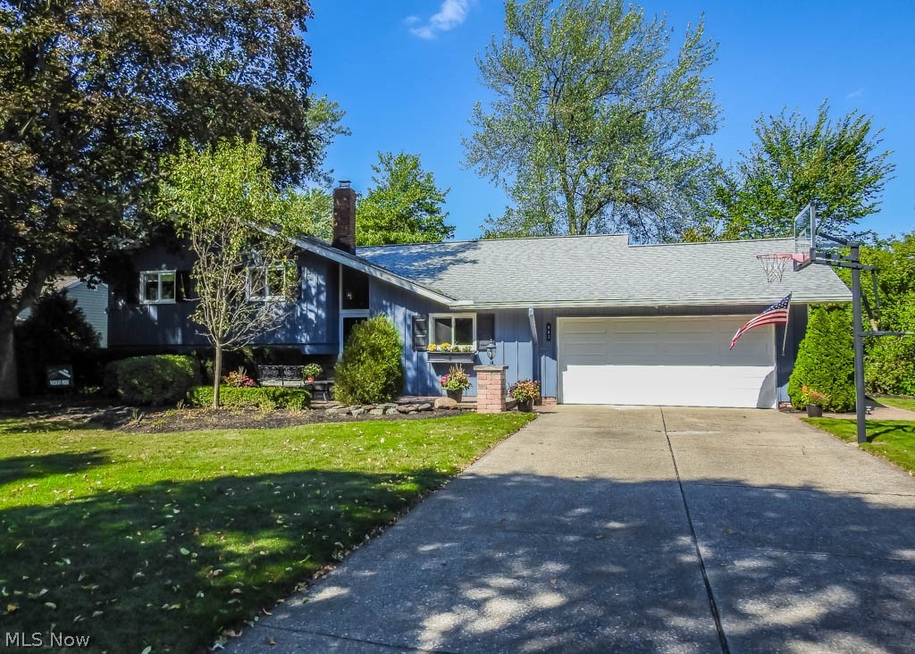 Beautiful split level in Highland Heights!! Walk into your foyer with high ceilings to your open main level that includes living room, dining room and kitchen! Perfect for entertaining, the updated kitchen has beautiful granite countertops, large island and is fully applianced, including a brand new conventional/convection oven. The oversized living room has two sliding glass doors, great for enjoying the view of your private backyard. Upstairs, you'll appreciate the hardwood floors throughout with three nice-sized bedrooms. The master suite has its own master bath with ceramic tile, beautiful fixtures and granite countertop vanity! The main bathroom on the upper level has a newer frosted glass shower door and granite countertop vanity! The lower level is sure to please with your gorgeous oversized family room boasting a gas fireplace, newer carpeting, new bay window with granite window ledge, wall cabinets that stay and a convenient half bath! The exterior of this home has been profes