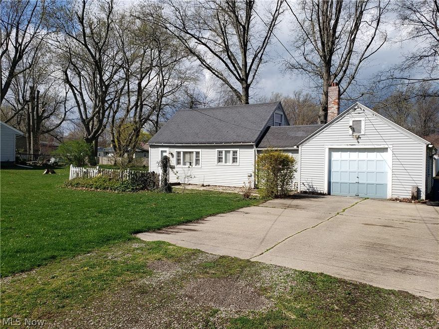 Cute as a button bungalow with a large yard-- front and back--in a neighborhood where the homes show pride of ownership. This little beauty is a diamond in the rough. She does need some tender loving touches to make her just perfect!! Close to historic Bridge St in Ashtabula Harbor and close to the lake and Walnut Beach. Could be a great investment as an Air BNB or VRBO rental. Come look for yourself and make her your own!!