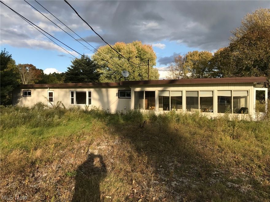 Bank owned 4 bedroom 2 bath home being sold in "As Is" condition sitting on approx. half acre lot.  Call to see.