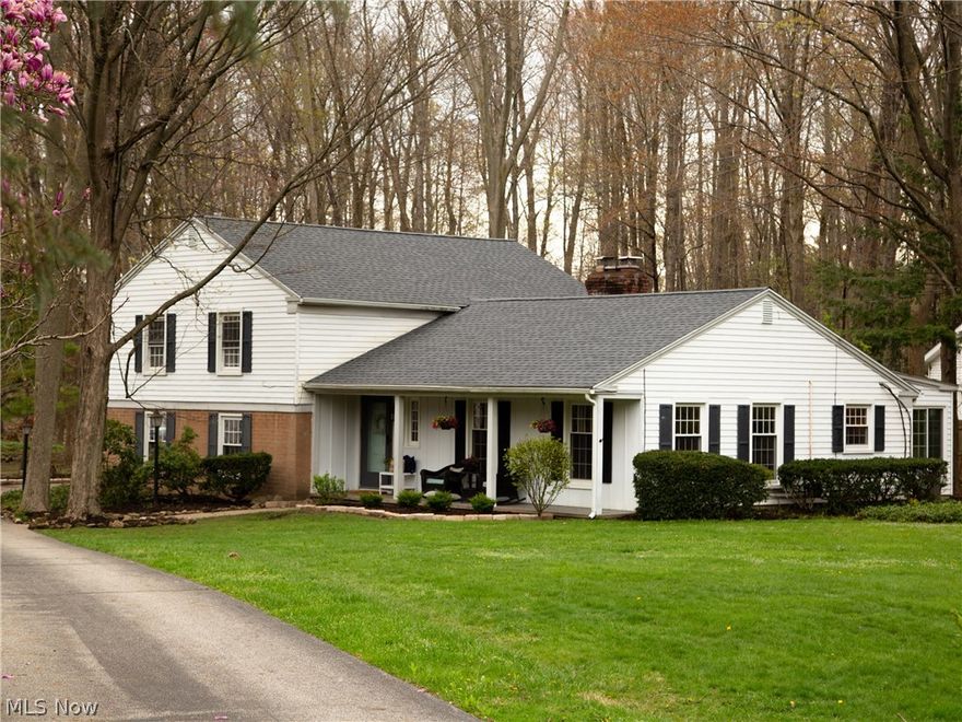Updated 4 bedroom home tucked away on a wooded 1 acre lot and quiet cul-de-sac in the award winning Chagrin Falls School District. The spacious layout includes a stone foyer; eat-in kitchen with granite counter-tops, newer stainless steel appliances, island, and hearth room; a sun-room addition with a wall of windows overlooking the scenic back yard and private deck; and a light and bright combined living/dining room with a second fireplace and lots of natural light. Step down into the spacious 25’ x 15’ family room with all new carpet and built-in shelving. 4 bedrooms and two full baths are found on the second level with new carpet throughout! This home offers fantastic outdoor living spaces including the large front porch overlooking the lawn, as well as the back deck, ideal for outdoor entertaining or relaxation, where you can enjoy the charming creek and wooded views. Plus wired for invisible pet fence, newer windows, new carpet throughout (April 2019), newly updated bathrooms, hot