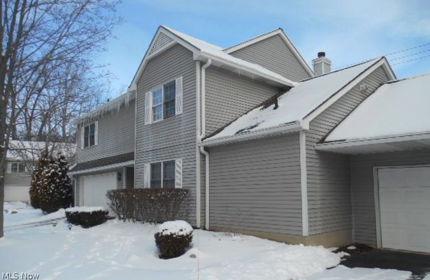 Welcome Home! Spacious Townhouse Is Located In The Heart Of Brecksville! Enjoy All The Amenities Of Brecksville Including Park, Rec Center, Golf Course, Library, Shopping and Restaurants! Large Eat-In Kitchen Features Breakfast Bar, Ceramic Tile,  Loads Of Counterspace and Cabinets, Greenhouse Window Perfect For Growing Herbs! Kitchen Opens To Great Room & Provides Open Floor Plan Perfect For Entertaining. Relax In The Great Room With Corner Fireplace. Sliders From Great Room Lead To Patio. Large Master Bedroom With Full Bath Plus An Additional Large Bedroom and Second Full Bath. The Interior Has Been Painted and There Is New Carpeting Throughout! 2 Car Attached Garage and Central Air Are Some Other Features. Brecksville-Broadview Heights School System!