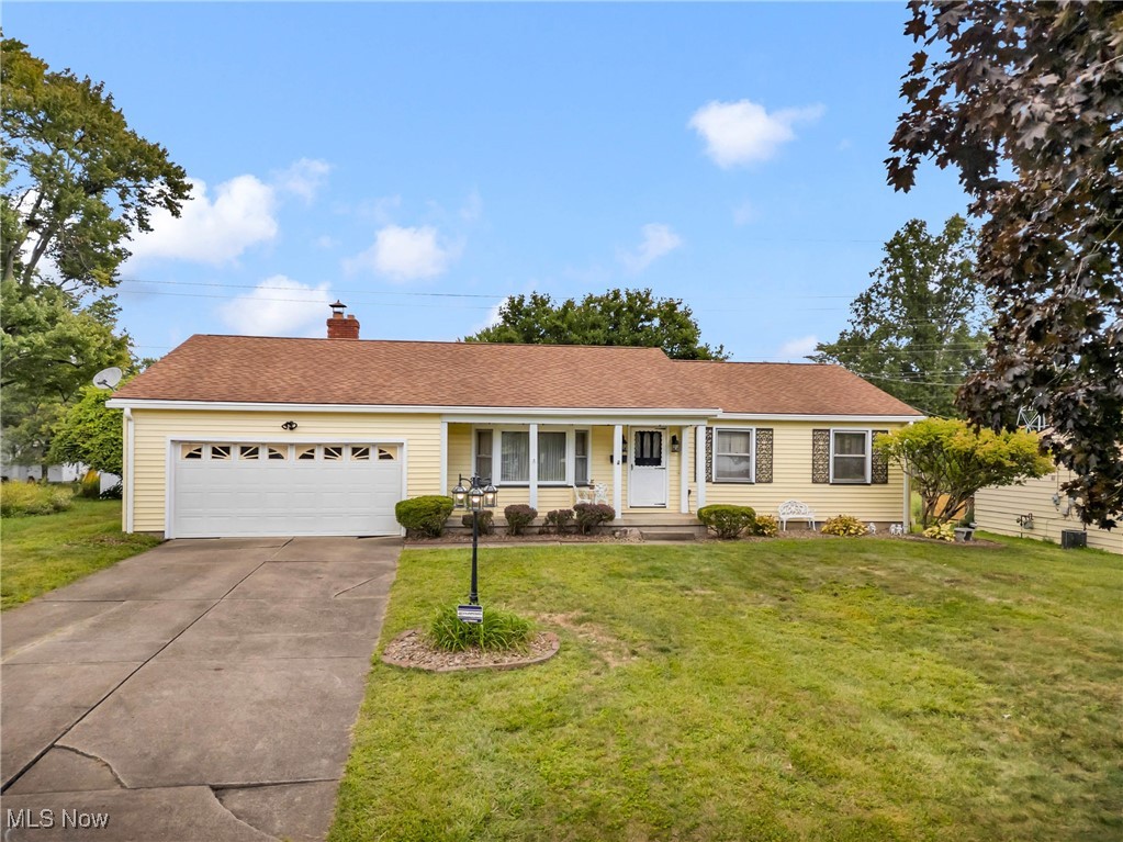 This Spacious Ranch home in the Boardman School District offers comfort, charm, and versatility—ideal for first-time buyers, growing families, or anyone who prefers the ease of single-level living. The floor plan includes 3 bedrooms and 2 full baths along with several inviting spaces to relax and entertain. Enjoy morning coffee on the covered front porch, gatherings on the rear deck, or quiet moments in the three-season sunroom. Inside, the generously sized living room with its large bay window, formal dining room and cozy family room create a warm and welcoming atmosphere.
The waterproofed basement offers peace of mind and endless possibilities, whether envisioned as a playroom, fitness space, craft area, or future living quarters. Storage is abundant with a clean, lit crawl space, a well-sized shed, and cabinets in the two-car garage. While move-in ready, this property also provides wonderful potential to make it your own. A little paint and personal touches can create impressive transformations, as shown in the example staged photo.
Character and modern updates come together beautifully—hardwood floors (also under the 2 other bedroom carpets), wainscoting, and built-ins complement the attractive kitchen with new stainless steel appliances, updated lighting/ceiling fans with remote controls, and Stylishly Renovated Bathrooms! Outside, the inviting front porch and classic lamp post enhance the curb appeal and create a charming setting for holiday décor! With new seamless gutters, recent power washing, a handsome roof and low-maintenance touches, peace of mind comes built in.
Located centrally to Boardman, Canfield, and Downtown Youngstown for popular eateries and shopping and just minutes from scenic Mill Creek Park. Come and see how this delightful home can be the perfect fit for your lifestyle!