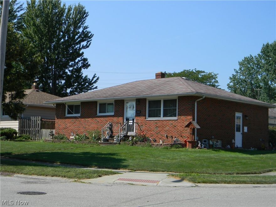 Brick 3 Bedroom Ranch with Updated Kitchen with Newer Kitchen Cabinets and Granite Counter Top, Built in Stainless Steel Dishwasher, Range and Refrigerator  Ceramic Floor, Dining Area,  Living Room with Hardwood Floors and Newer Lighting fixture, Master Bedroom With Half Bath, And Updated Full Bath with Ceramic Tub surround, Bedrooms With Hardwood Floors ,Newly Painted Interior, Large Breeze Way with new Laminated floor and slider to Covert Wood Patio and Garage Full Basement , Newer Vinyl Windows , and Glass Block , Updated Electrical Box,, Newer Furnace And Central Air , 2 Car Attached Garage with Opener , Newer Concreate Drive , And a Fenced In Yard ,